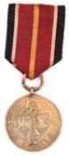 A Third Reich medal for the Spanish “Blue Division”, which fought on the Russian front, with ribbon.
