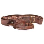 A WWII period officer's Sam Browne belt, with crossstrap and sword frog. GC £30-40
