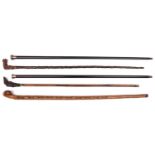 3 walking sticks: folk art carved boxwood, hollow pierced containing balls and cylinders, with
