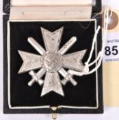 A Third Reich War Merit Cross with Swords, the pin stamped “1”. GC in its fitted case.