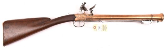 A rare bronze barrelled and bronze framed flintlock boxlock blunderbuss with spring bayonet, by