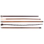 5 Walking Canes: malacca with bone top inset with ebony studs; dark wood with white metal golf