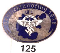 A Third Reich oval pin back enamelled badge, with white NSFK device in the centre with initials “WL”