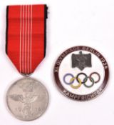 A Third Reich 1936 Olympic Games medal, with ribbon; and an enamelled pin-back Olympics judges