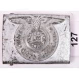 A Third Reich SS man's belt buckle, of silver-painted steel, the back stamped with RZM mark, “155/