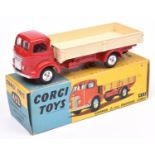 Corgi Toys Commer (5 Ton) Dropside Lorry (452). Red cab and chassis, with cream rear loadbed, a