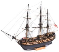 A wooden kit built model of HMS Victory. A well constructed ship of plank on frame construction with