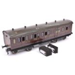 A Gauge One railway Bing 1921 GWR Brake Third corridor compartment coach with opening doors. 132, in