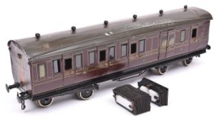 A Gauge One railway Bing 1921 GWR Brake Third corridor compartment coach with opening doors. 132, in