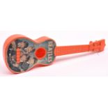 A Beatles Selcol Junior Guitar. A 1963 issued orange plastic guitar with 4 nylon strings in