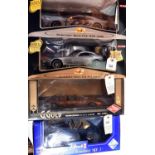 4 1:18 scale cars. 2x Maisto - Mercedes-Benz SLR McLaren in metallic silver. Mercedes-Benz CLK-DTM