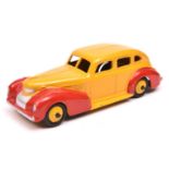 A fine Dinky Toys 39 Series Chrysler Royal sedan (39e). A U.S. export example in deep yellow and red