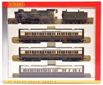 A Hornby OO gauge The Cambrian Coast Express train pack (R2196M). Comprising; a GWR Castle Class 4-