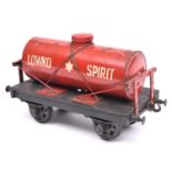 A Gauge One Bassett Lowke Spirit Tanker. With a red tank and wooden chassis, 'Lowko Spirit' to