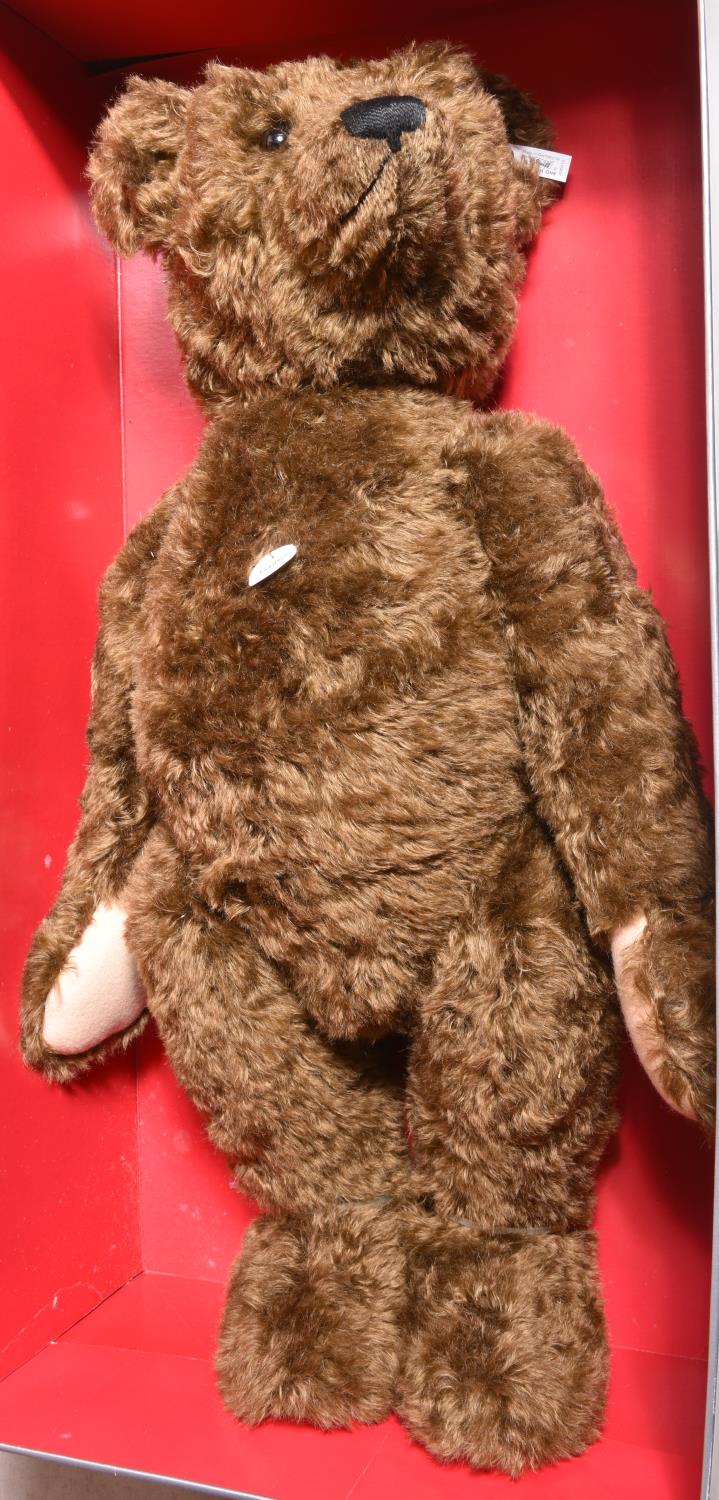 A Steiff replica Teddy Bear 1907 Brown 70, (406010). A Dark Brown mohair fur Teddy Bear with a