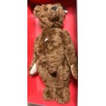 A Steiff replica Teddy Bear 1907 Brown 70, (406010). A Dark Brown mohair fur Teddy Bear with a