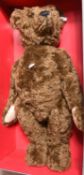 A Steiff replica Teddy Bear 1907 Brown 70, (406010). A Dark Brown mohair fur Teddy Bear with a