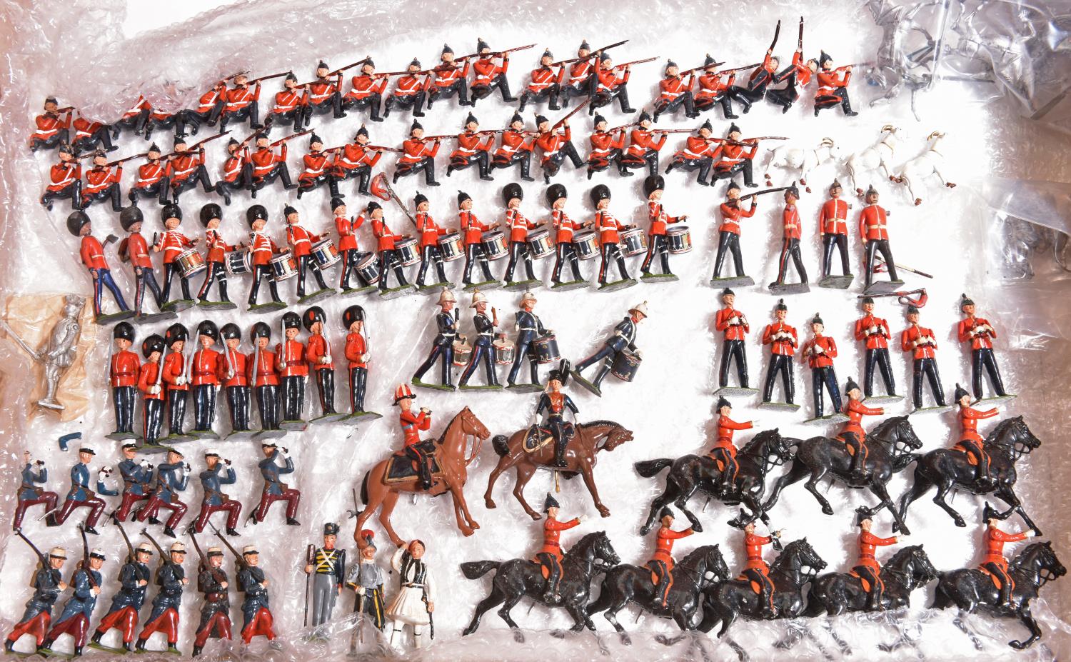 90+ Britains lead soldiers. Including; mounted officers, Officers with binoculars, Guards Officers