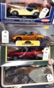 4 1:18 scale Cars. Chrono 1997 Lotus Elise in Norfolk Mustard. Kyosho Triumph TR3A in Yellow.