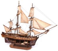 A wooden kit built model of HMS Bounty. A well constructed ship of plank on frame construction