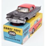 Corgi Toys Ford Thunderbird (214S). Example in dark metallic grey with red roof and yellow interior,