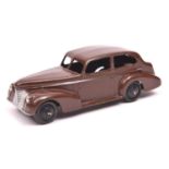 Dinky Toys 39 Series Oldsmobile 6 sedan (39b). An example in dark brown with black painted base,