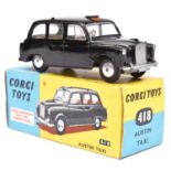 Corgi Toys Austin TAXI (418). In gloss black with yellow interior, early example with smooth spun