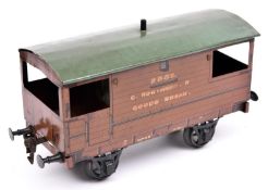 A Gauge One Marklin for Gamages GNR 8-ton Goods Brake Van, 2885. With brown wood-effect litho