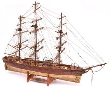 A wooden kit built model of a 3-mast Barque. A well constructed ship of plank on frame