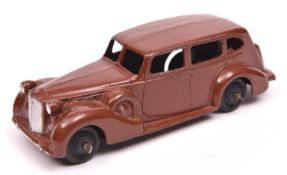 Dinky Toys 39 Series Packard Super Eight (39a). An example in dark brown with ridged black wheels