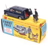 Corgi Toys B.M.C. Mini Police Van with Tracker Dog (448). Van in dark blue with red interior, POLICE
