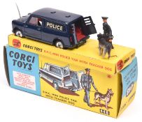 Corgi Toys B.M.C. Mini Police Van with Tracker Dog (448). Van in dark blue with red interior, POLICE
