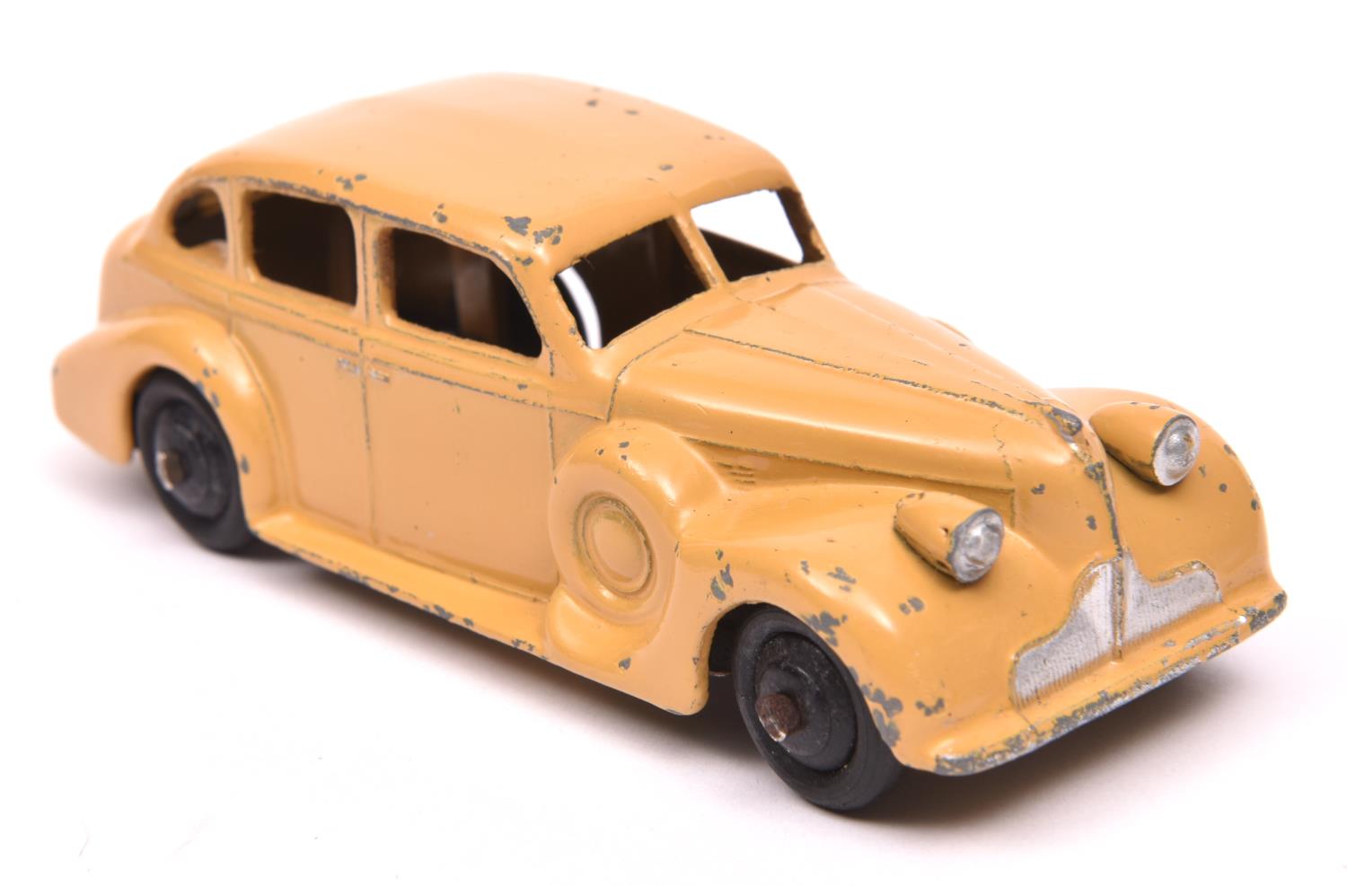 Dinky Toys 39 Series Buick Viceroy (39d). A harder to find example in sand with black painted