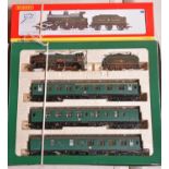 2x Hornby OO gauge locomotives. A Schools Train Pack (R2082) comprising; a BR Schools Class 4-4-0