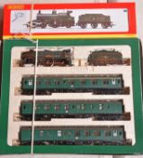 2x Hornby OO gauge locomotives. A Schools Train Pack (R2082) comprising; a BR Schools Class 4-4-0