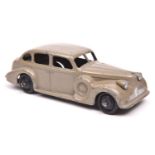 Dinky Toys 39 Series Buick Viceroy (39d). An example in fawn with black crackle painted base,