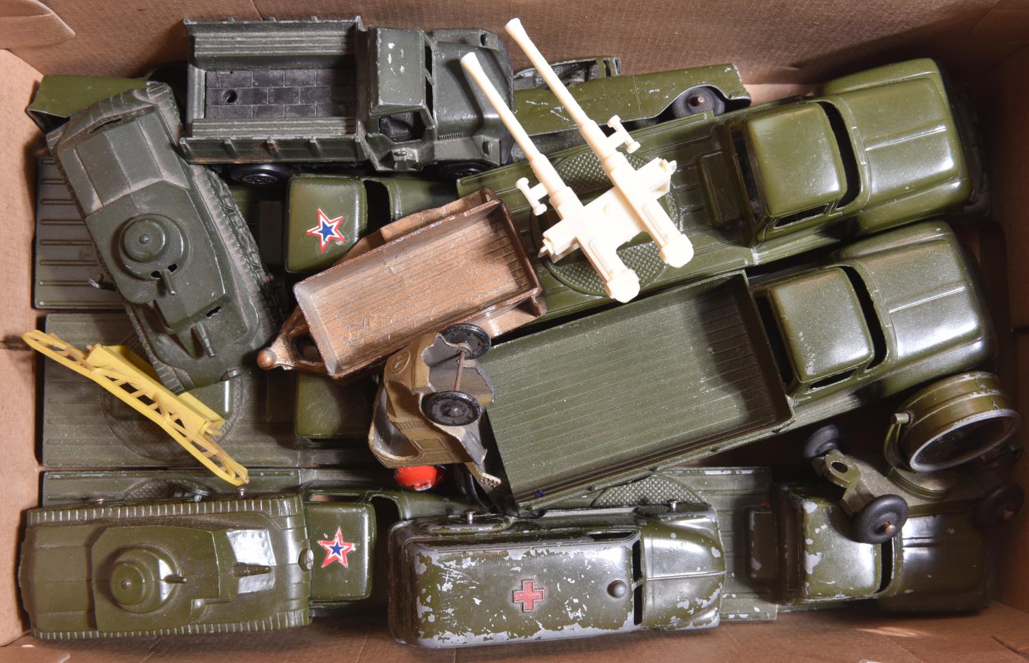 Quantity of Tootsie etc military vehicles. 8 bonneted trucks, variations- 6 with fittings for