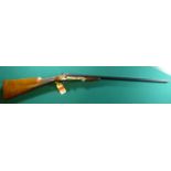 *A Belgian DB .410" side lever folding shotgun, 41" overall, barrels 25½”, no visible number,