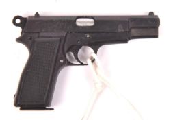 A finely crafted non working miniature Browning Mk I Hi-Power automatic pistol, c 1940, 2" overall