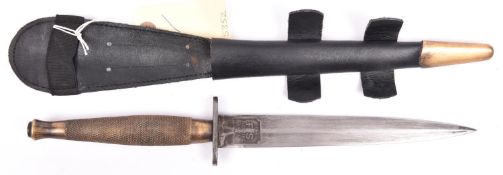 A WWII 2nd Pattern FS fighting knife, with etched panel “The FS Fighting Knife”, hatched bronze