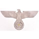 A Third Reich cast aluminium alloy wall eagle, wingspan 28¾” (73cm), the back marked “GAL Mg-Si