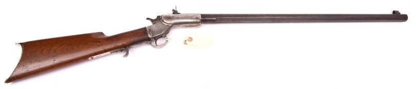 A .32” rimfire Stevens centre hammer tip down rifle, number 10431, 40½” overall, heavy octagonal
