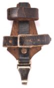 A vertical leather hanger for Third Reich SS or NSKK dagger, the plated spring clip bearing
