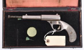A pre-1933 .177" Dolla pop out air pistol, 9½” overall with barrel out, of nickel plated cast iron