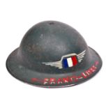 A WWII British army steel helmet, with “France Libre” and tricolour added in red, white and blue