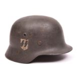 A Third Reich M1935 German steel helmet, bearing SS and state decals. GC (chinstrap missing) £150-