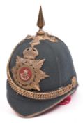 A scarce post 1902 officer’s green cloth home service helmet of the 3rd Royal Jersey Light