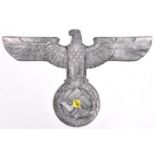 A Third Reich cast aluminium alloy wall eagle, wingspan 15" (38cms), no maker’s marks, the fixing