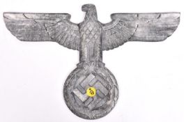 A Third Reich cast aluminium alloy wall eagle, wingspan 15" (38cms), no maker’s marks, the fixing