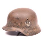 A Third Reich M35 single decal steel helmet, with maker’s mark and size “ET62” (Eisenhuttenwerke),